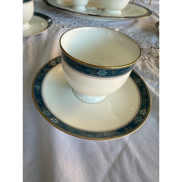 A breathtaking gold and blue porcelain tea and coffee service for 12 by Oscar de la Renta. Collection “Aviance Blue”. Made...
