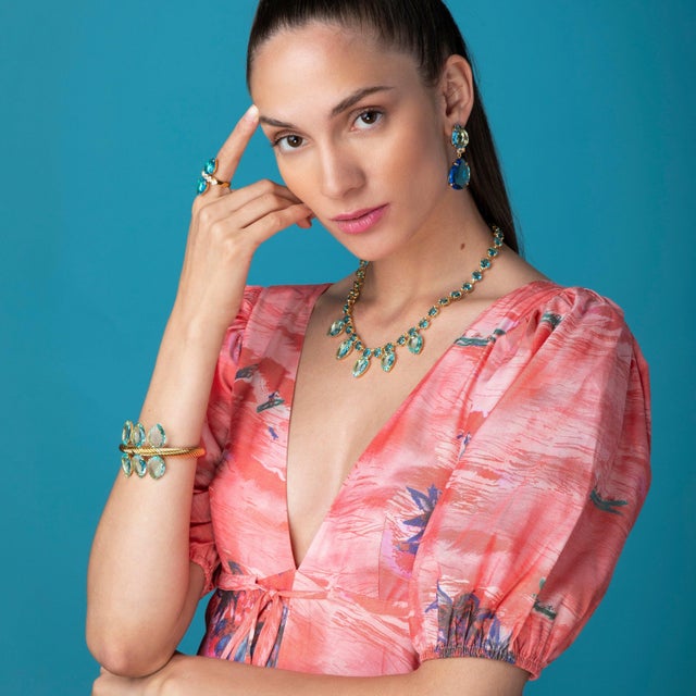 The Jazmine Earrings, meticulously crafted from semi-precious stones, boast a unique 2-way convertible design with...