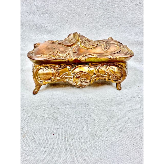 Beautiful antique large Art Nouveau jewelry casket. Features a floral design. Elegant lines and detailing. Perfect to use...