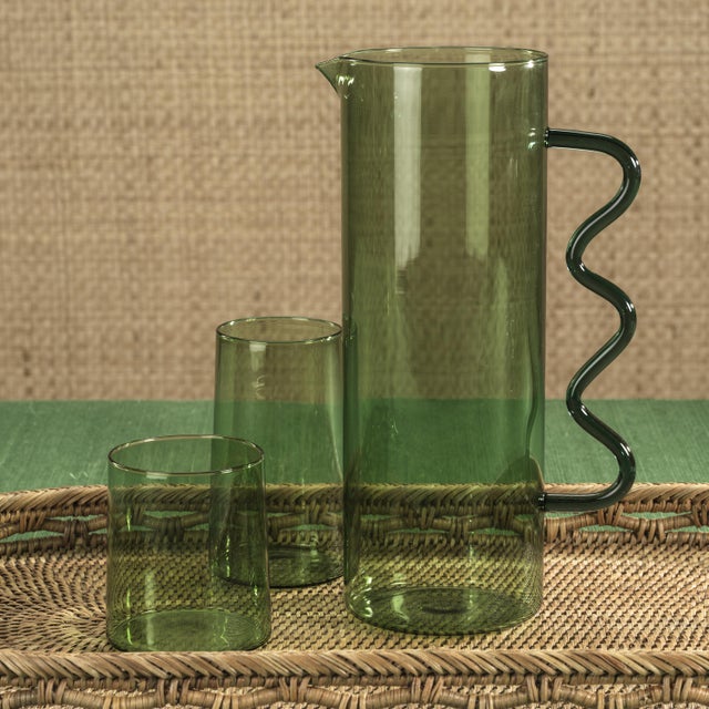 Elevate your drinkware collection with the Costa de Sol Glass Pitcher. Featuring a transparent colored design, this...