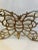 Welcome to Turtle and Crane! Let us tell you about this exquisite Vintage Butterfly Trivet in the style of Virginia...