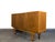 A rare and exceptional Edmond J. Spence buffet/credenza from the celebrated "Coronation" line, dating to the 1950s. This...