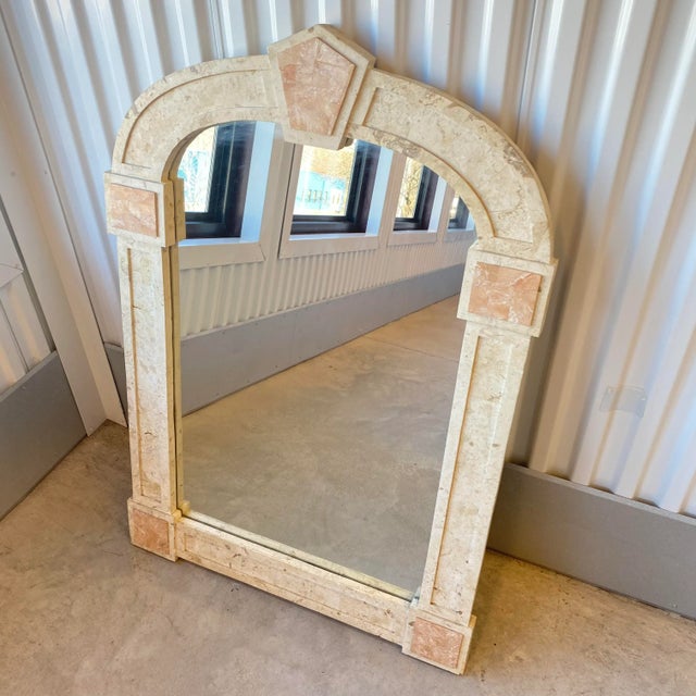Vintage circa 1990s postmodern travertine and blush marble accent mirror. Inlaid blush marble make the accents on this...