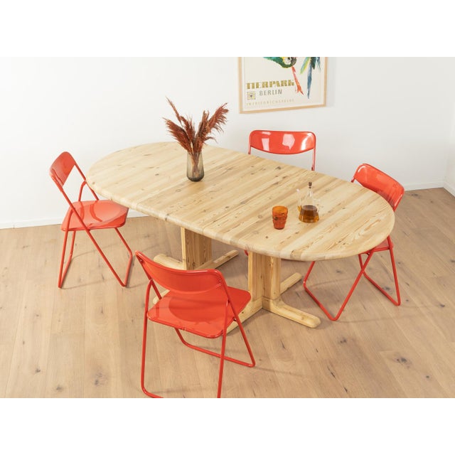 Classic dining table from the 1980s. High-quality frame and table top made of solid bleached pine wood. Quality features:...