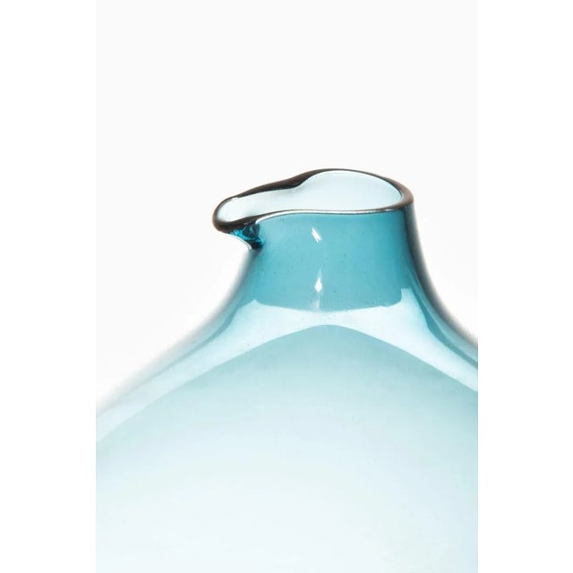 Rare glass vase designed by Kjell Blomberg. Produced by Gullaskruf in Sweden. This piece is attributed to the mentioned...