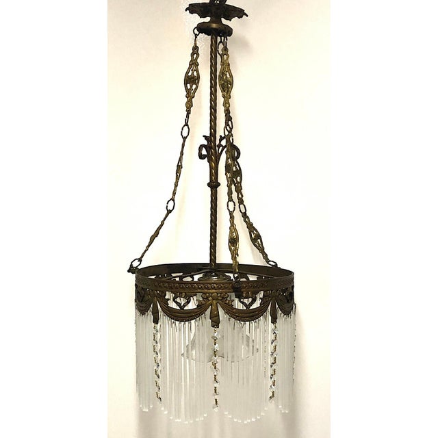 Antique French Brass Glass Rod Single-Light Chandelier, 1890s, in Very Good conditions. Designed 1890 to 1919 I have...