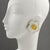 Harriet Bauknight for Kaso designed those gorgeous white and yellow frosted lucite or resin clip-on earrings. They boast a...