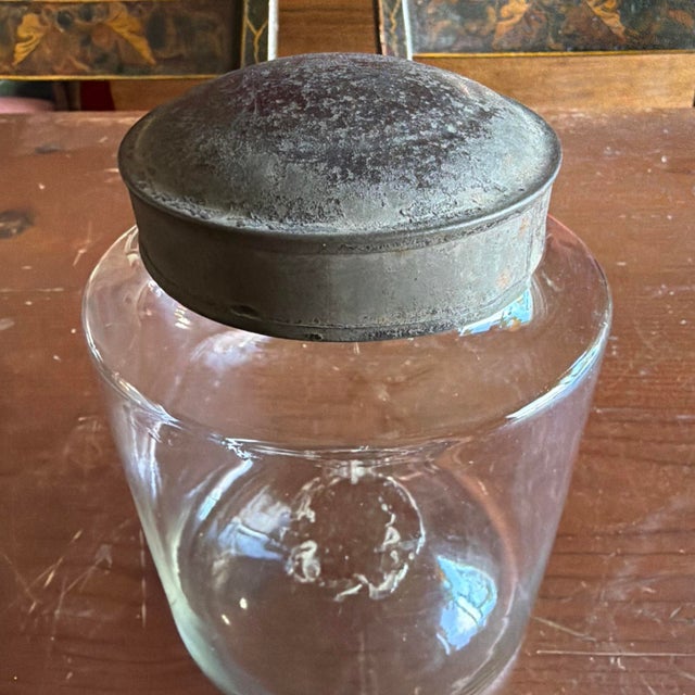 A Nice Antique Blown Glass Storage Container with Tin Lid, Circa 1850 Likely produced in the glasshouses of the eastern...