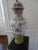 A beautiful covered jar with foo dog on top well decorated from the 20s.