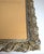 This vintage ornate metal frame has a wonderful antiqued (patinaed) brass finish and is typical of the mid-20th century...