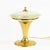 This Art Deco table lamp, crafted from glass and brass, will be an excellent addition to a shelf or nightstand due to its...