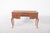 Dressing table in carved wood with curved legs. The sinuous lines of the top accompany the front and sides of the piece of...