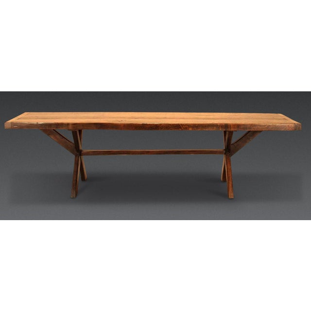 A wonderful early 19th century tavern table of grand proportions and all in solid oak. The unusually thick 3" plank top...