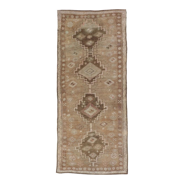 Vintage Turkish Kars Gallery Rug With Warm Brown and Soft Pastel Accents For Sale
