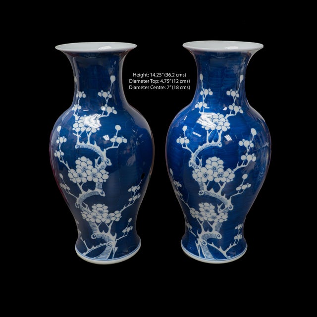 Vintage Chinese hand painted, blue and white Jingdezhen Jiangxi Porcelain floral, celestial shaped pair of vases. The...