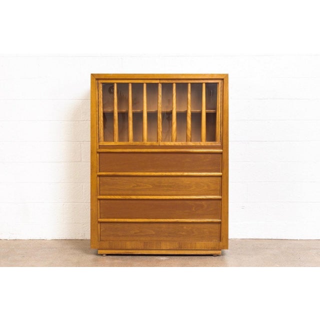 This exceptional vintage mid century secretary desk with bookcase was designed by British-born T.H. Robsjohn-Gibbings for...