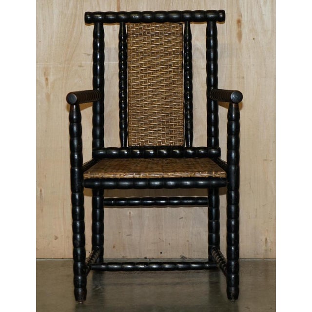 Exceptionally rare, Ebonished and Maple wood Rush seat armchair designed by Josef Zotti and manufactured by Prag Rudniker...