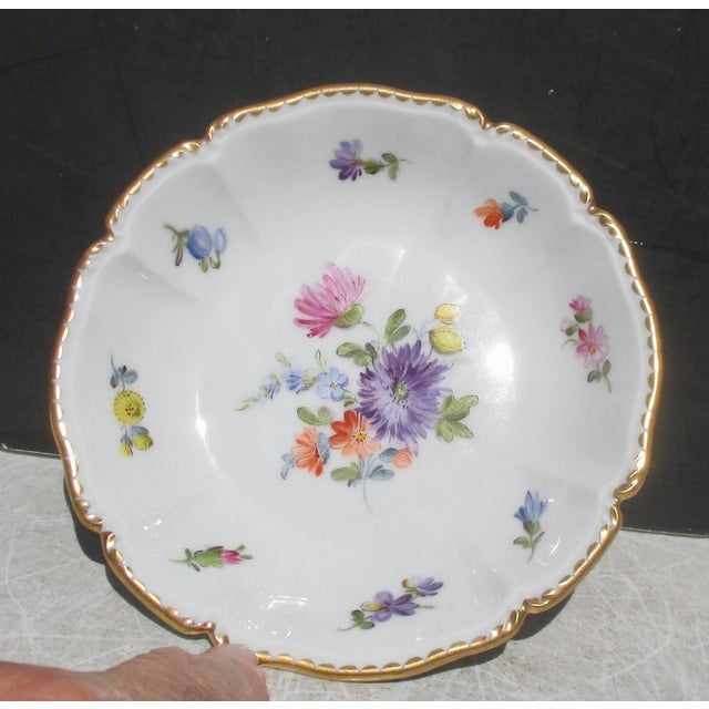 Nymphenburg porcelain Saucer, hallmarked West Germany, with Nymphenburg mark and model numbers in red. The dish measures...