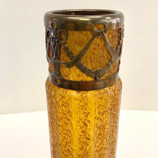 Beautiful textured honey amber art glass vase, slightly iridescent and with a brass collar mount. A beautiful accent...