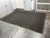 Design Plus Gallery presents a 9 ft × 12 ft Jute Area Rug from Pottery Barn. This woven rug has a black field accented by...