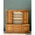 Exemplifying robust craftsmanship and timeless architectural presence, this vintage monumental rustic pine hutch is...