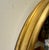 Italian gilt wood oval mirror with brass loop finial. Great size, Measures 27" high x 20" wide x 1.5" deep, (3" in height...