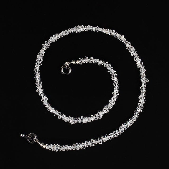 This 17‑inch necklace showcases a strand of **sparkling 6x4mm Herkimer “Diamond” crystals**, celebrated worldwide for...