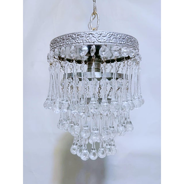 Elevate your interior styling with the icy glamour and shimmering brilliance of this vintage three-tier crystal waterfall...