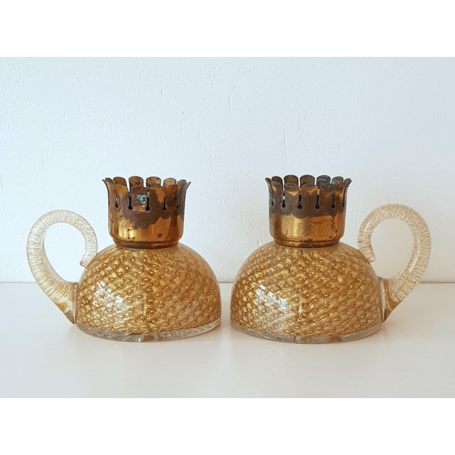 Magnificent handcrafted lamp bases that become candlesticks thanks to the brass insert. If this is removed, the feet can...