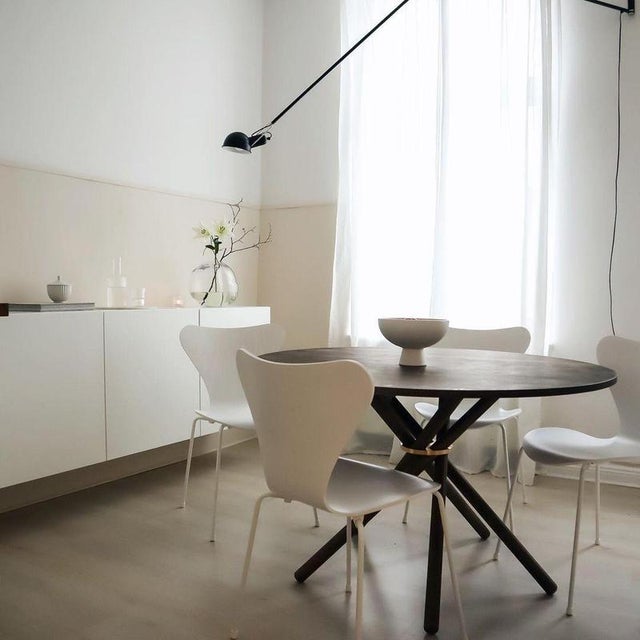 Hector Dark Oak Dining Table 105 by Eberhart Furniture Dimensions: D 105 x H 73 cm. Materials: Dark oak, brass. Hector 105...