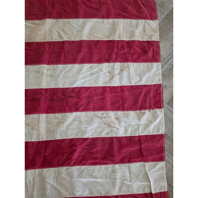 Early 20th C Cotton American Flag With Patina For Sale - Image 11 of 18