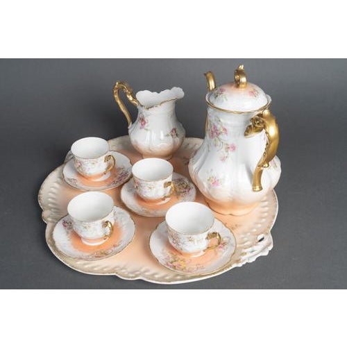 Early 20th century limoges porcelain tea service. Early 20th century limoges porcelain tea service. Tray: h: 43cm, w:...