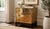 This brass-clad three-drawer chest is attributed to Sarreid Ltd. and reflects the company’s signature campaign-inspired...