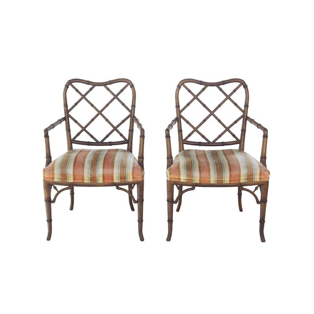 USA, 1950s Pair of faux bamboo Hollywood Regency armchairs. Elegant and classic dining or side chairs. These had a swatch...