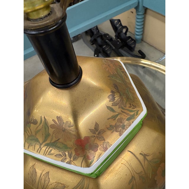 Morris Greenspan pair of hand-painted lamps without shades. Includes matching brass harps and solid brass wreath finials....