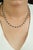 This tennis necklace showcases 10.52 carats of natural blue sapphires set in 14K White Gold. The sapphires accented by...