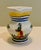 Cheerful small hand painted Quimper pitcher with bright colors and iconic Breton woman and flowers--brightens up any space...