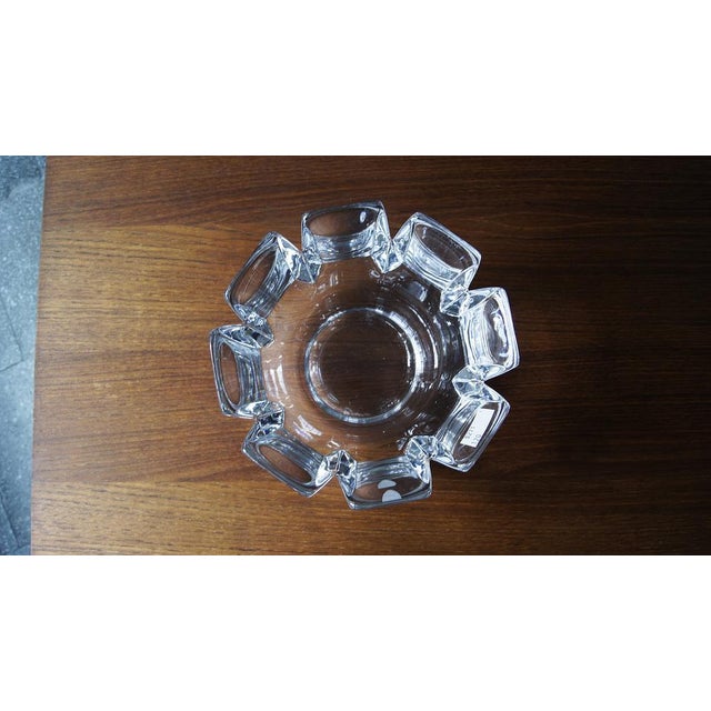 This beautiful piece of crystal art glass was designed by Lars Hellsten for Orrefors and is known as the Corona Bowl....