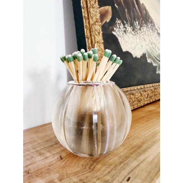 A lovely antique circa 1900 glass match striker with sterling silver rim. Excellent antique condition, just some small...