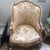 A distinguished Pair of Louis XIV os de mouton (mutton bone) Bergeres armchairs in carved walnut with characteristic...