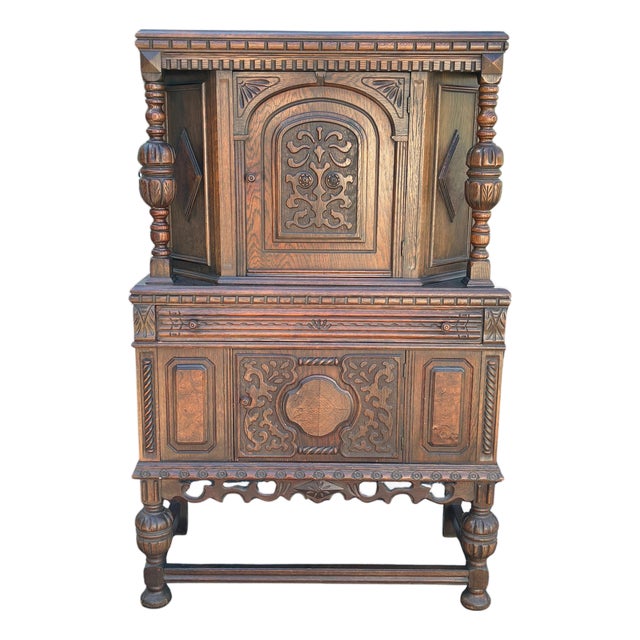 Early 20th Century Jacobean Revival Carved Oak Court Cupboard Cabinet For Sale