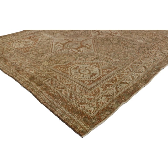 52434 Distressed Antique Persian Shiraz Rug, 05'00 x 07'07. This hand knotted wool distressed antique Persian Shiraz rug...