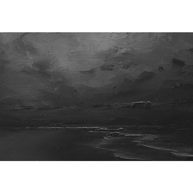 Shores of Next Year features a dramatic seascape rendered in a monochromatic palette, where swirling clouds dominate the...