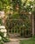 A wonderfully weathered antique ornamental iron garden gate with exceptional architectural character, believed to date to...