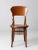 This is a classic wooden antique bentwood chair. Exhibiting sophisticated features with a round seat, triple turned...