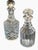 A pristine pair of British spirits decanters. Unsigned. Victorian style three ring decanter 4.5 in x 4.5 in x 10 in...