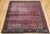 Exceptional Early 19th Century Agra Area Rug in an all over floral pattern in magenta-red field with an eggplant color bor...