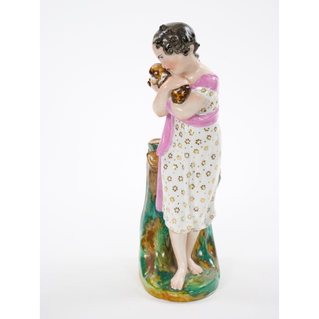 This charming antique Austrian porcelain sculpture was made in Vienna in the mid to late 19th century and beautifully...