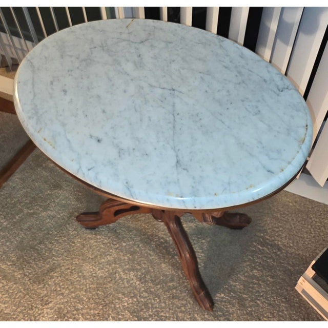 Antique Victorian Eastlake Marble -top Walnut Parlor Table table, late 19th century (circa 1870–1890). Featuring a thick,...