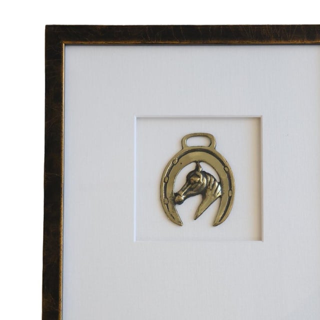 This elegant antique horse bridle medallion, dating back to 19th century France, features a finely crafted horse design,...